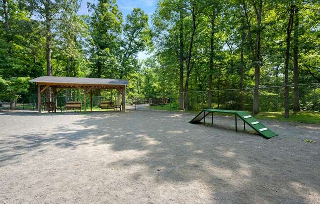 a park with a pavilion and a skate park