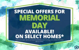 A sign advertising special offers for Memorial Day on select homes.
