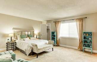 Bedroom in a Signature series 2-bed, 2-bath apartment at Somerset Lakes, featuring a spacious layout and natural light.