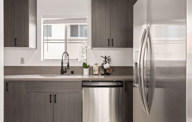 A 4 bedroom, 3 bathroom apartment with a dining room & a fully functional kitchen at 10791 Ohio Ave. Unit 2