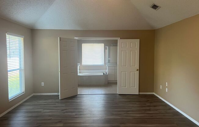Large 4/2 with 2 Car Garage & Huge Fenced Backyard in the Heart of Lake Mary!