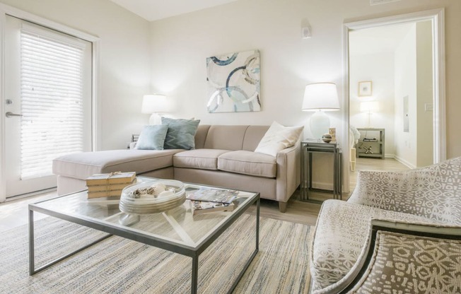 a living room with a couch and a coffee table