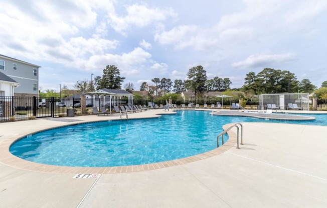 our apartments have a resort style pool with chairs