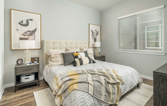 a bedroom with a bed and a window at Grandstone at Sunrise, Peoria, AZ