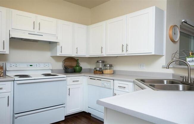 Village at Main Street | Spacious Kitchen with White Cabinetry and White Appliances
