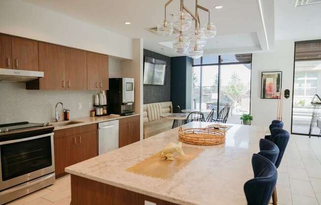 a kitchen and dining room with a marble counter top