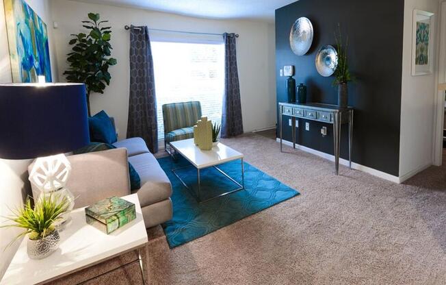 Model apartment with accent wall and furniture at the Grove at St. Andrews, Columbia, SC