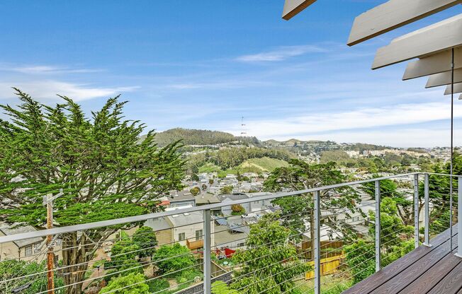 Come see this rare amazing Golden Gate Heights home with stunning views, 3 decks, big yard and hot tub!