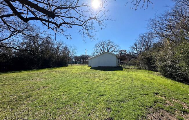 Updated 3 Bedroom, 2 Bath home with Oversized Fenced Yard