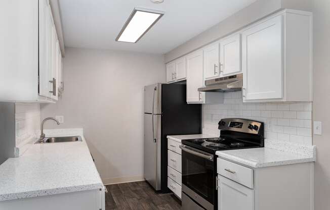 Novela Apartments Kitchen Counters and Appliances