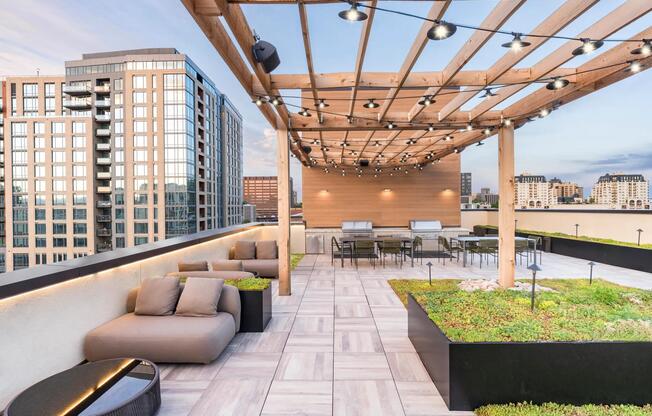 Modera Golden Triangle boasts a beautifully landscaped rooftop courtyard with a grilling area, providing a serene escape and stunning city backdrop.