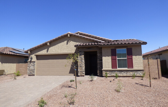INCREDIBLE PRICE for an almost new home in Goodyear!