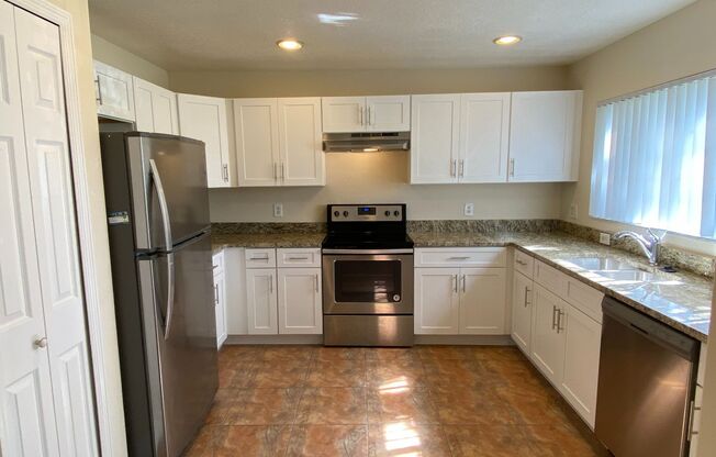 Adorable 3 bedroom / 2.5 bath town home with newly remodeled kitchen!