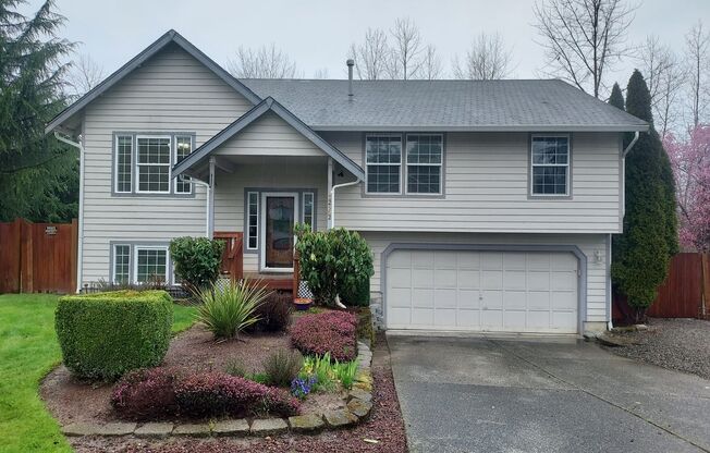 4 bedroom 2.75 bath, Huge Fenced Yard with Landscaping Included!!