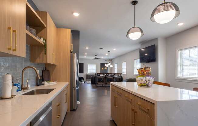 a kitchen with a large counter top and a sink