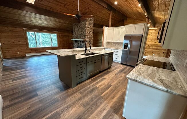 NEWLY REMODELED FARMHOUSE STYLE HOME ON THE 13TH HOLE OF THE WOODMOOR GOLF COURSE!!!!