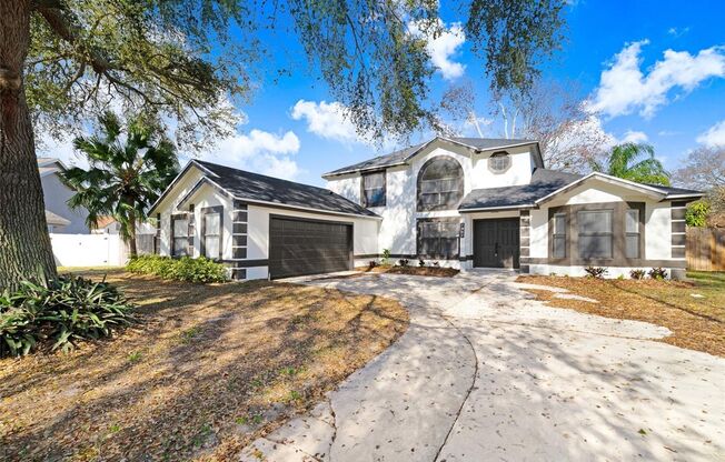 Beautifully Renovated 4/2.5 Pool Home with Full Service Pool Care Included in the Desirable Dr. Phillips Area - Orlando!