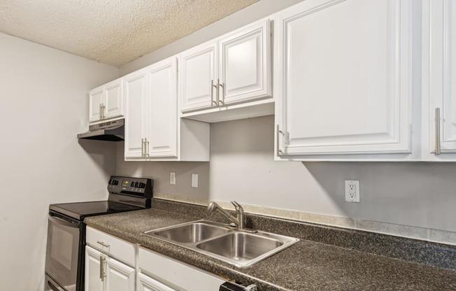 A classic kitchen with white cabinets