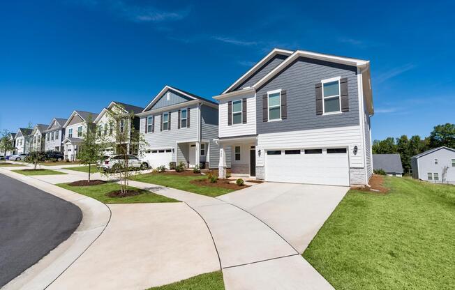 The community features spacious detached homes with attached garages, private driveways, and thoughtfully designed streetscapes that bring together the benefits of home living with the convenience of a professionally managed rental community.