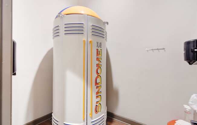 a water heater in a room with a white wall