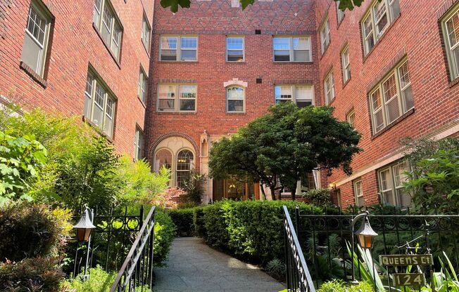 Queens Court Large Charming 1 Bedroom Available Now! Highly Desirable Queen Anne Location.  ONE MONTH FREE!