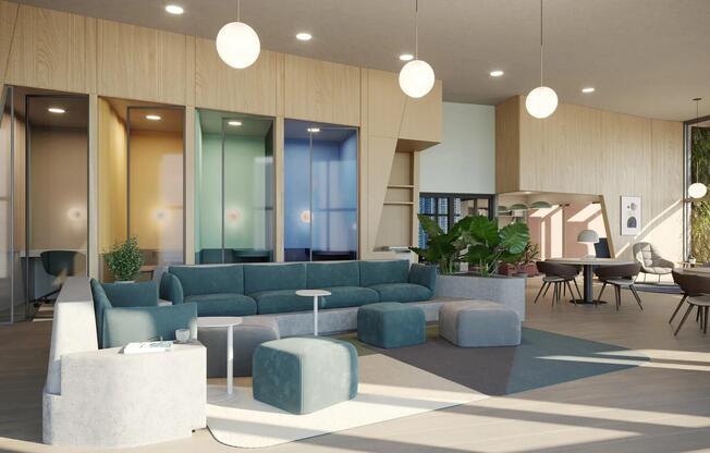 Coworking space with work pods and comfortable seating areas at Modera Riverside in Miami, FL.