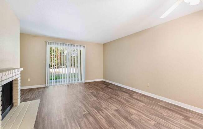 Saratoga Apartments in Everett, Washington Living Room with Fireplace