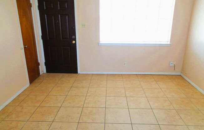 Cute Single Level Northeast Home With Refrigerated Air Located In Quiet Neighborhood