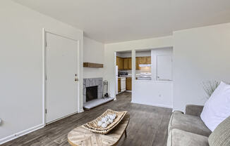 a living room with a couch and a table