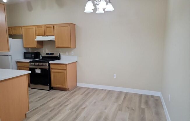 GORGEOUS SW 1st FLOOR UNIT IN GATED COMMUNITY!!