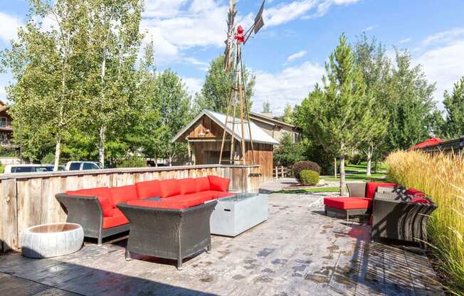 a backyard with a fire pit and patio furniture at Mullan Reserve Apartments, Missoula Montana