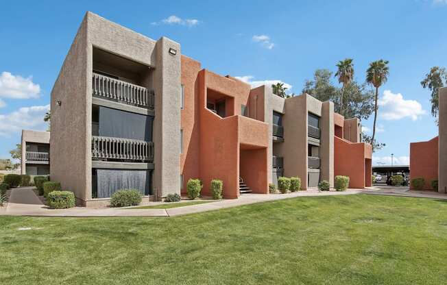 A modern building with a red and beige exterior.