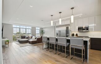 Elegant 2BR at The Adora | 1,500+ SF, Chef’s Kitchen & Garage Parking!