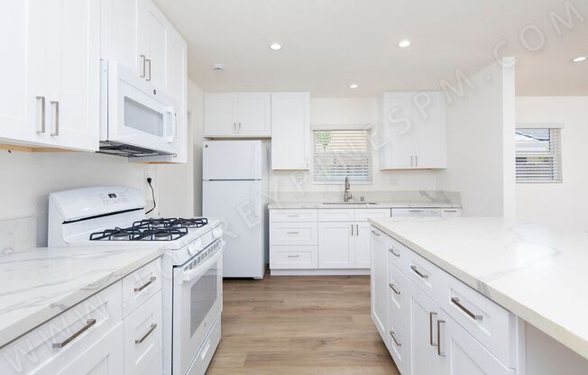 Spacious 4 Bedroom, 2 Bath Home with Private Yard and 2 Car Garage!