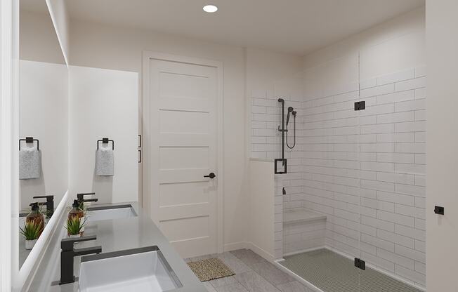 a white bathroom with a shower and a sink