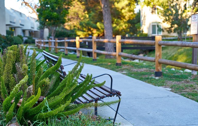 Community bench near the stunning creek at Creekwood Villas