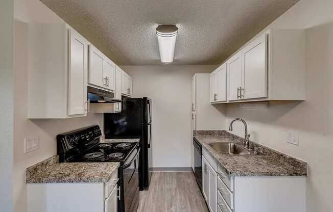 A Standard Kitchen at Morningtree Park Apartments