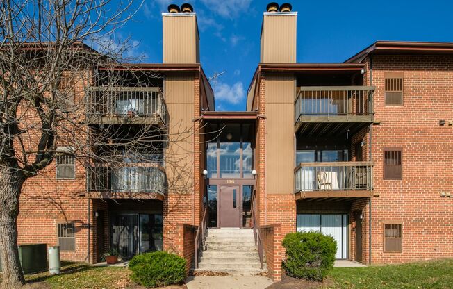 Renovated 3rd floor top level condo with vaulted ceilings.