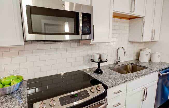 kitchen with tile backsplash at Berkshire Dilworth, Charlotte, 28204