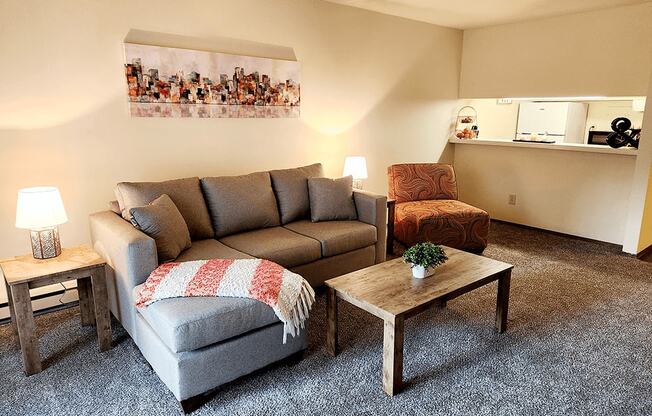 a living room with a couch and a coffee table