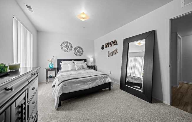 Big bedroom with natural lighting at Westwood Village Apartments in Westland, MI