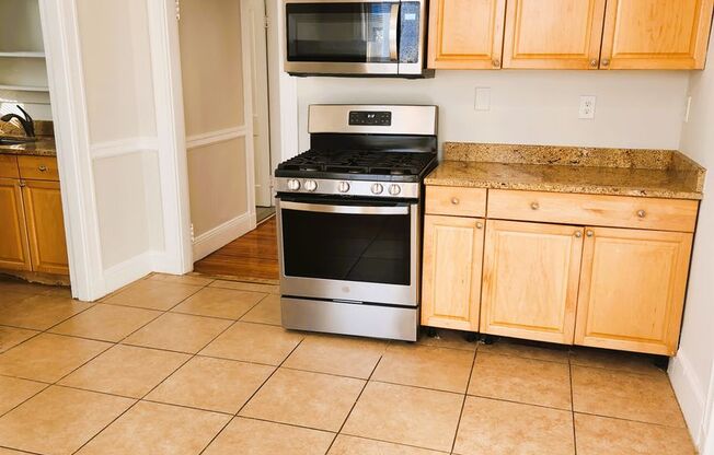 Spacious & Updated Dorchester Center 4 Bedroom Apartment With 2 Car Parking