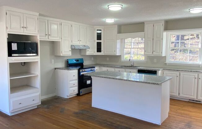 Charming 4-Bedroom Home with Spacious Yard and Stylish Interior