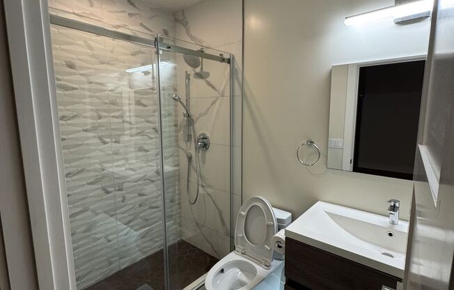 Newly Renovated 800 Sq Ft 2BR/1BA Garden-Level Unit in Parkside with Private Entrance & Backyard Access