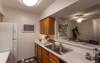 This is a photo of the kitchen in the 822 square foot, 2 bedroom, 1 bath floor plan at Village East Apartments in Franklin, OH.