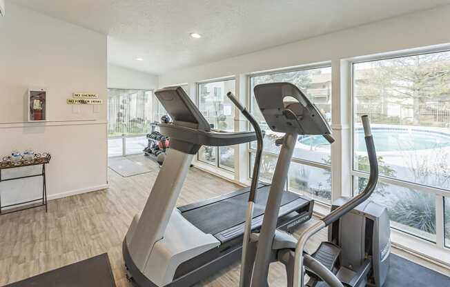 the preserve at ballantyne commons fitness room with treadmill and large windows