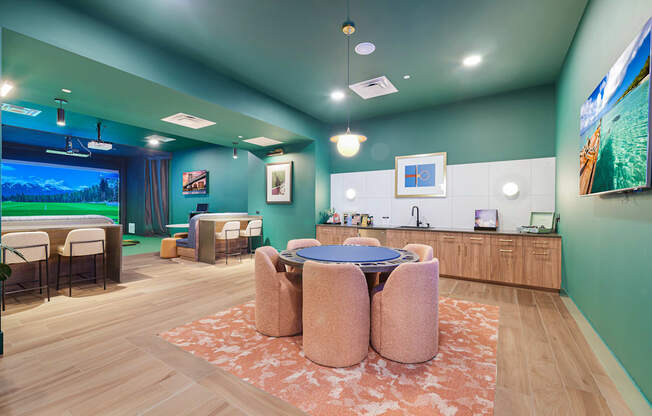 A room with a blue ceiling and a pink rug.