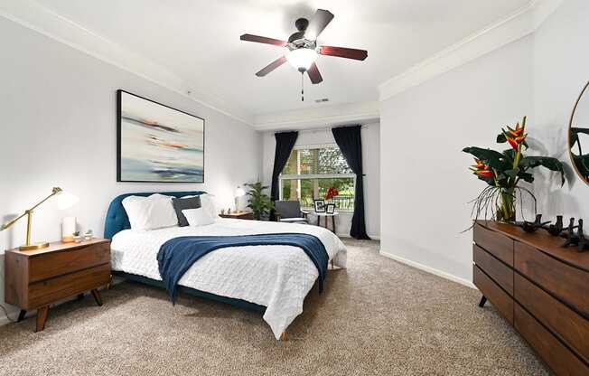 a bedroom with a bed and a ceiling fan at Sovereign at Overland Park, Overland Park, 66213  