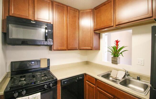 Modern Kitchen with Microwave at Creekside Villas Apartments, San Diego, CA