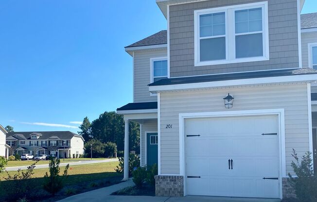 3 bed/2.5 bath at end unit townhome in Berkeley Walk at Savannah Quarters with garage